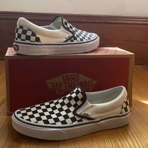 Checkered board slip on vans